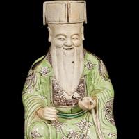 A Chinese famille verte-decorated figure of Cai Shen, mounted as lamp 素三彩財神改制檯燈 Kangxi period ???