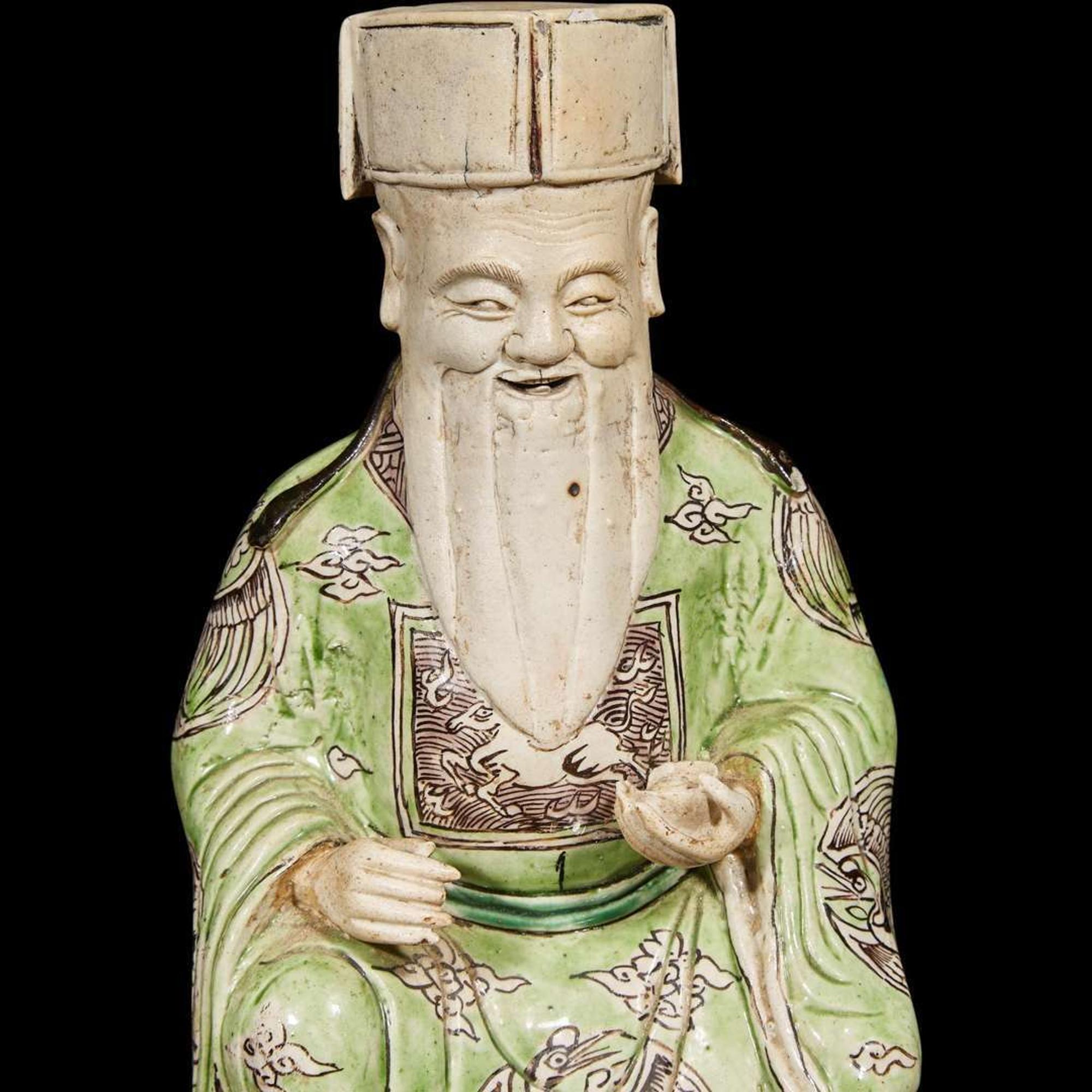 A Chinese famille verte-decorated figure of Cai Shen, mounted as lamp 素三彩財神改制檯燈 Kangxi period ???