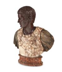 An Italian Carved Breccia Marble and Porphyry Bust of Augustus