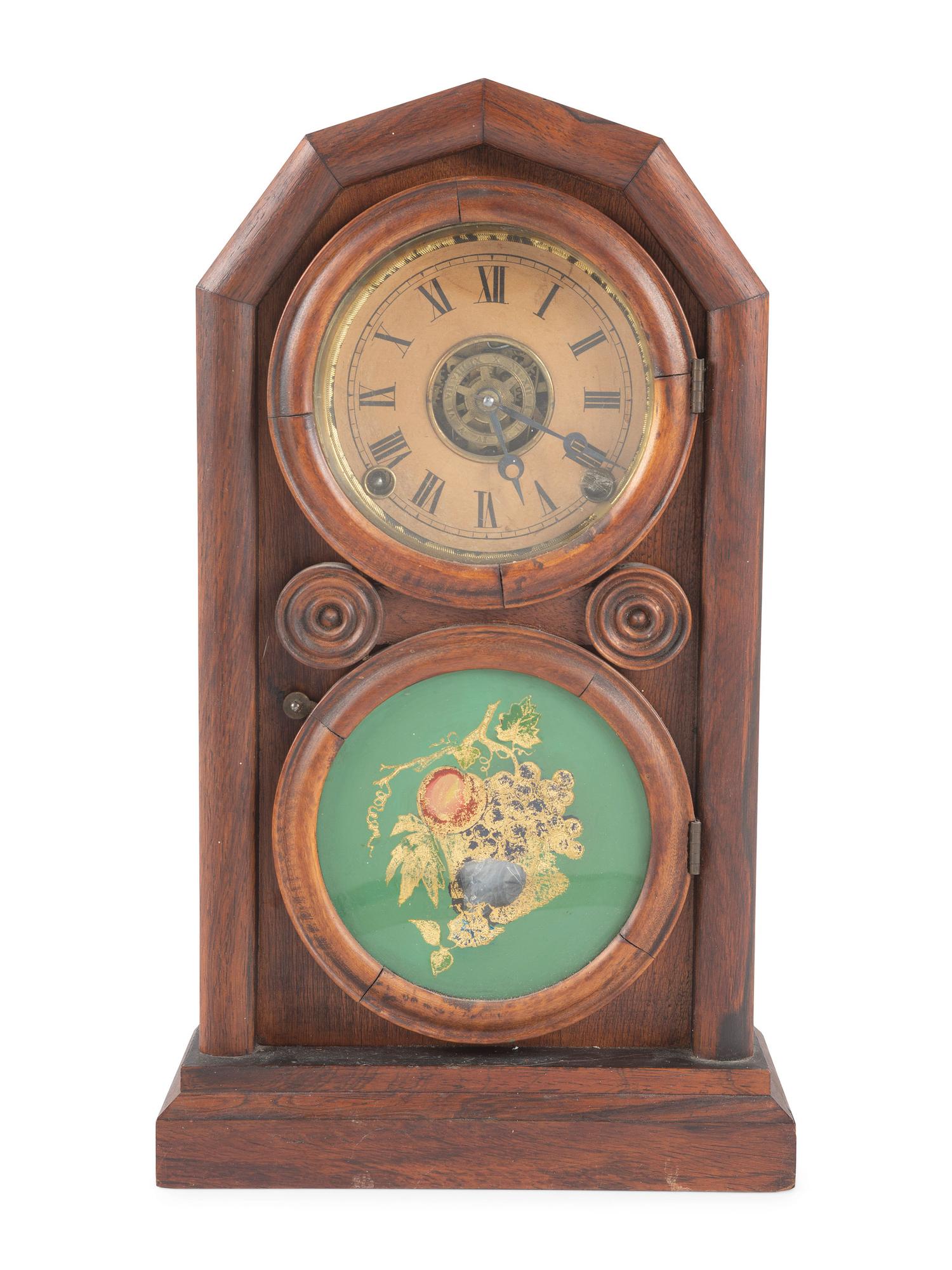 An Ingraham 'Mosaic Front Doric' Mantel Clock