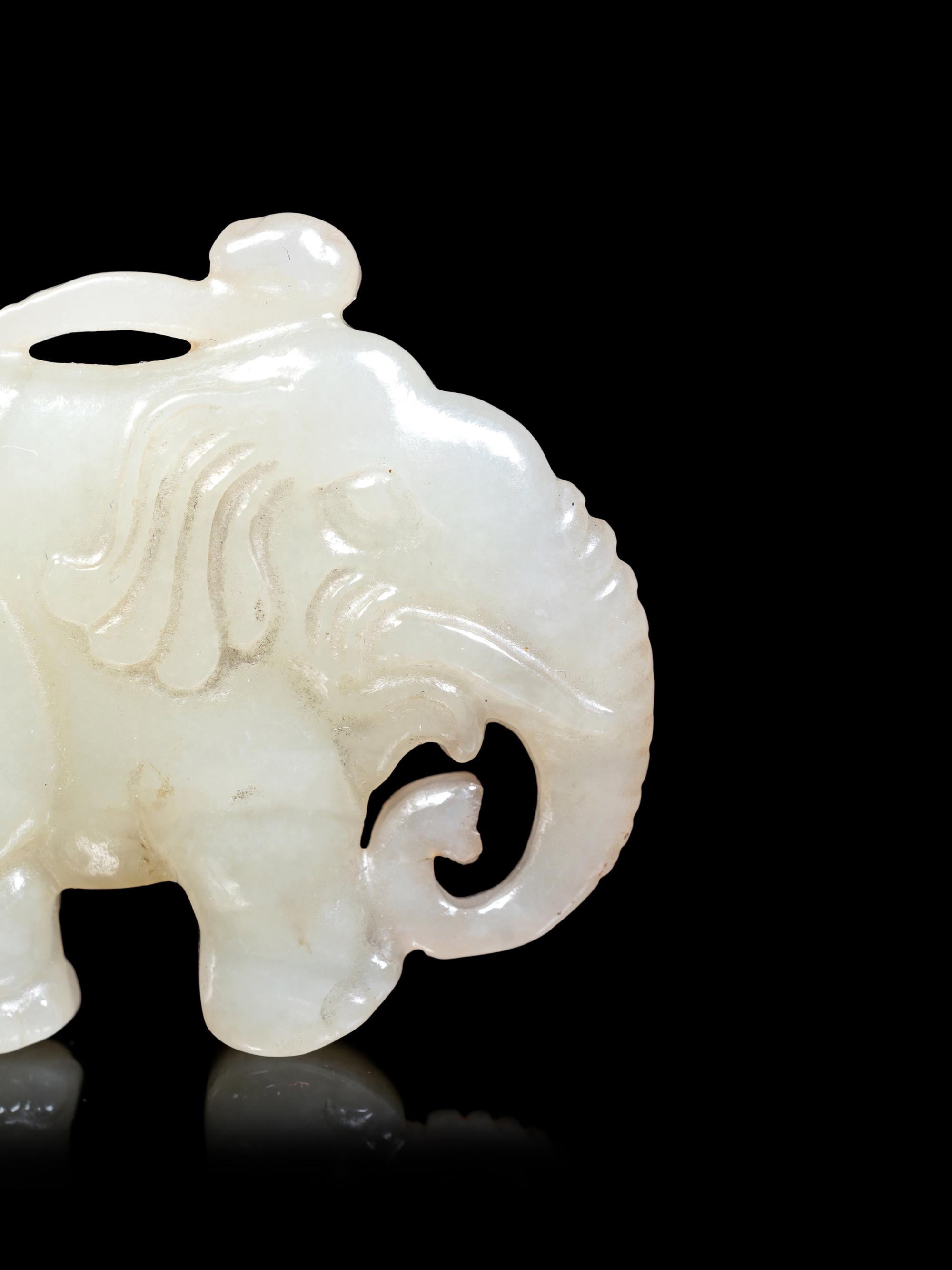 Four Chinese Celadon Jade Carvings of Animals