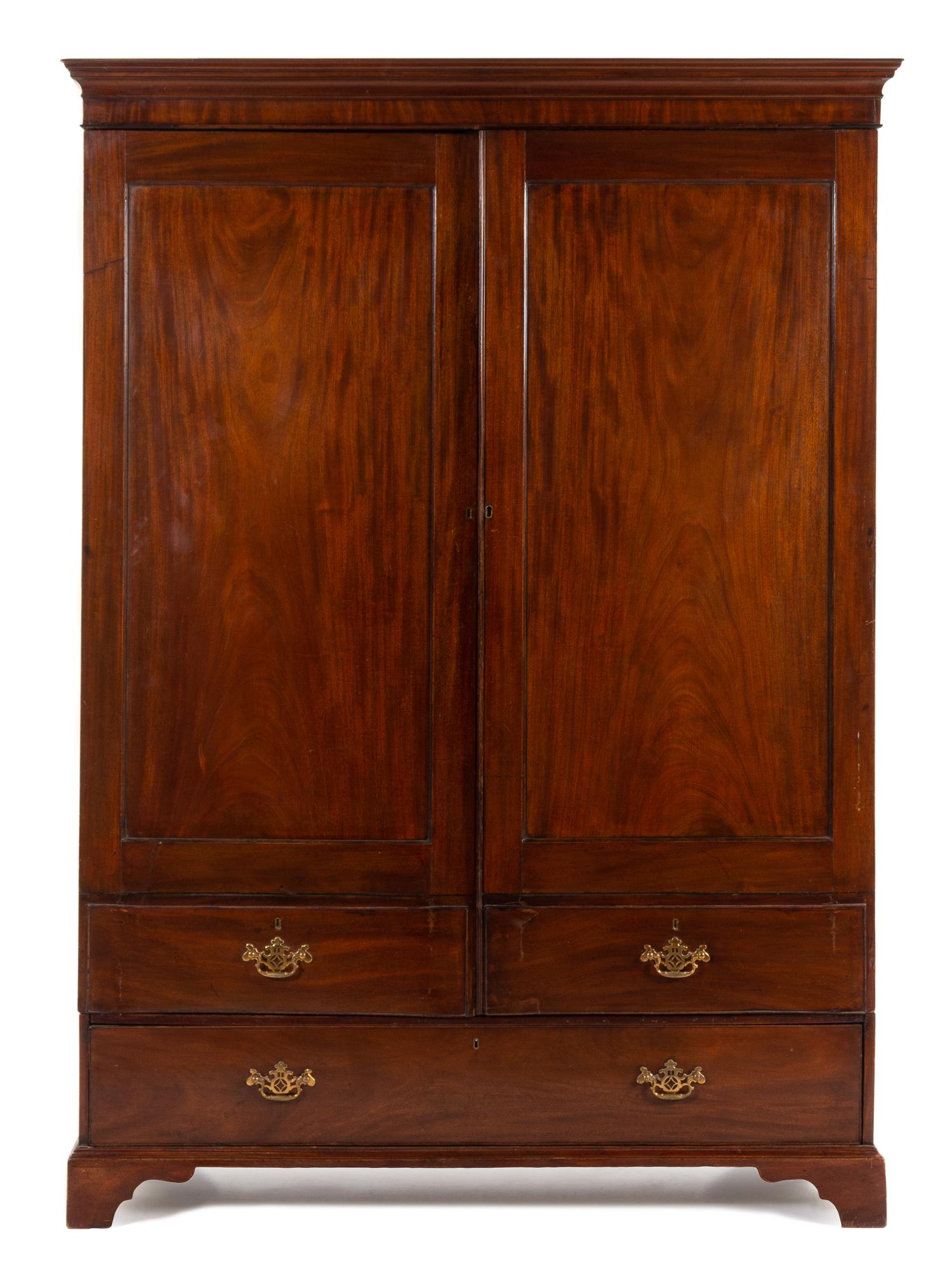 A George III Mahogany Wardrobe Height 83 x width 61 x depth 22 inches. — 18TH/19TH CENTURY