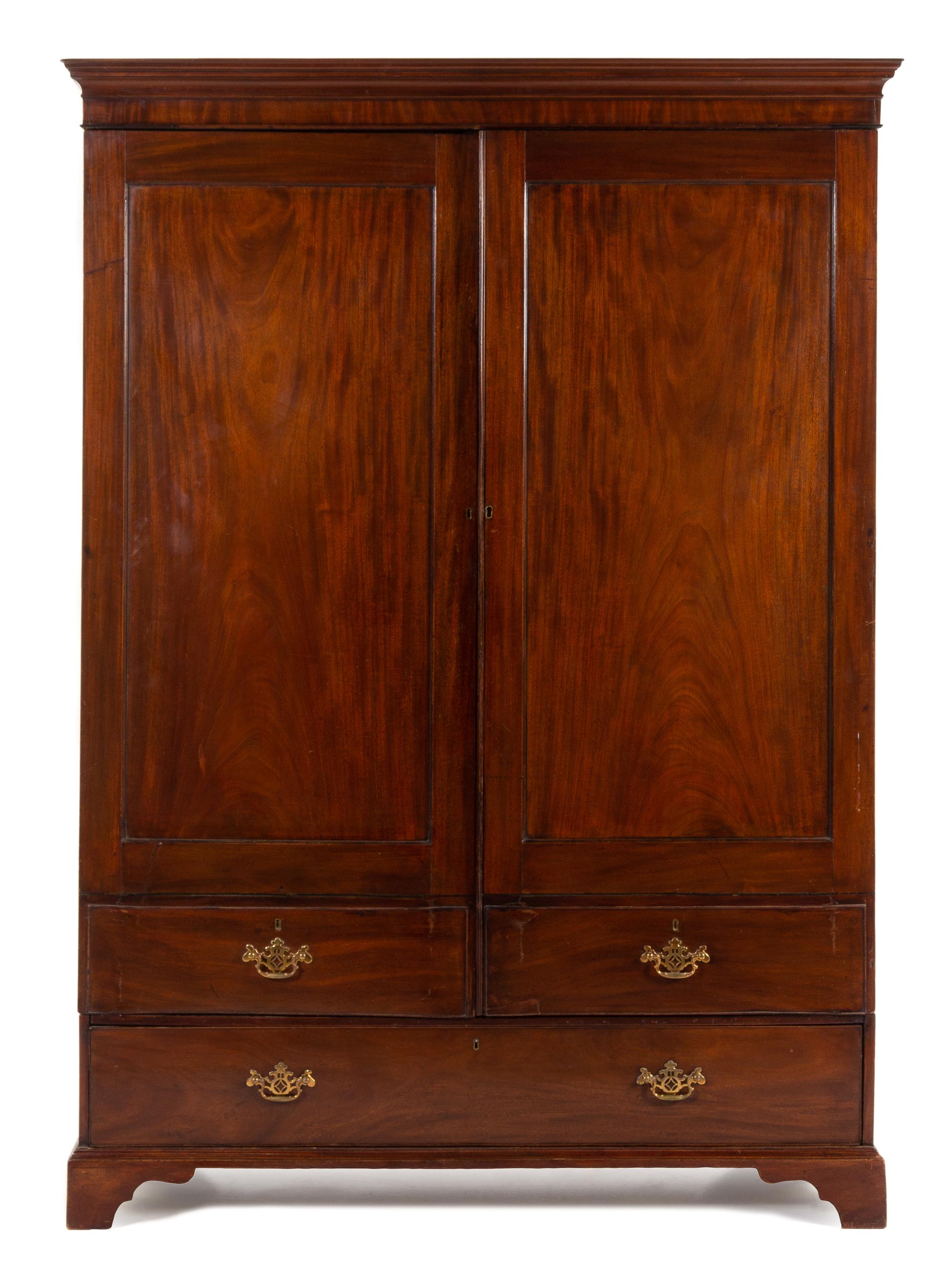 A George III Mahogany Wardrobe Height 83 x width 61 x depth 22 inches. — 18TH/19TH CENTURY
