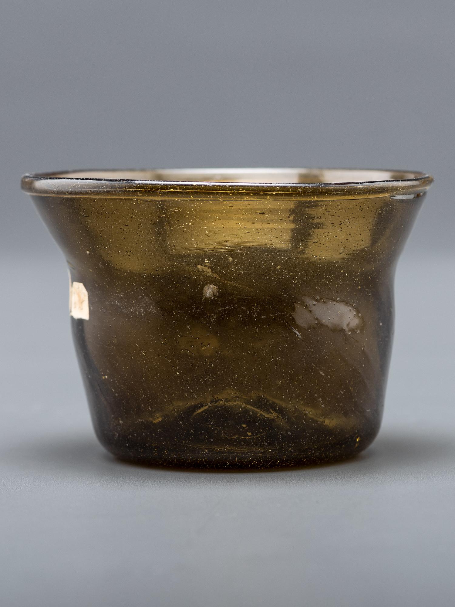 A Blown-Glass Eating Bowl in Olive Green