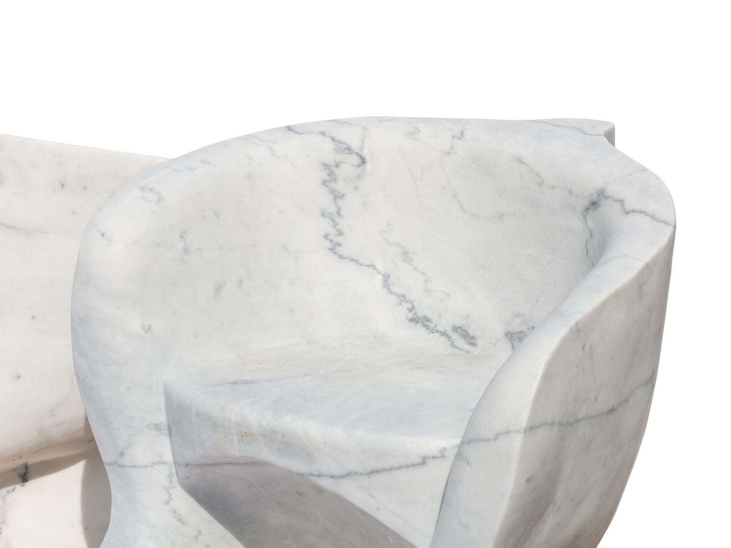 A Pair of Italian Carved White Marble “Face” Chairs