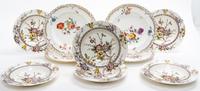 A Group of English Porcelain and Ceramic Dinnerware Diameter of dinner plates 10 1/2 inches.