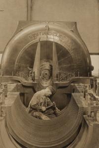 Lewis Hine (1874-1940) The heart of the turbine: Repairing turbine in power house, 1930