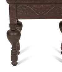 A Pair of Continental Carved Oak Cabinets on Stands