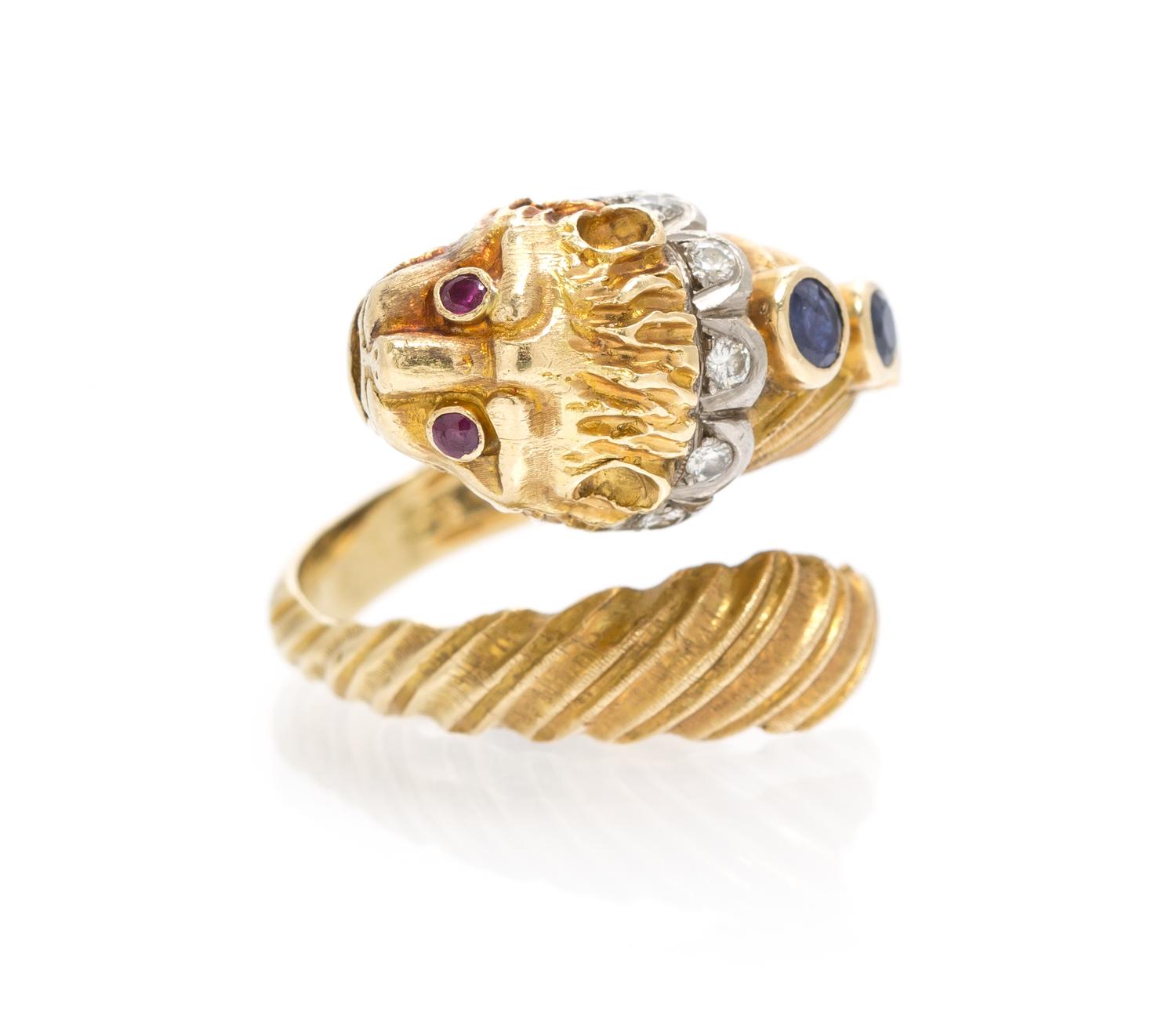A Yellow Gold, Sapphire, Diamond and Ruby Lion Ring, 7.20 dwts.