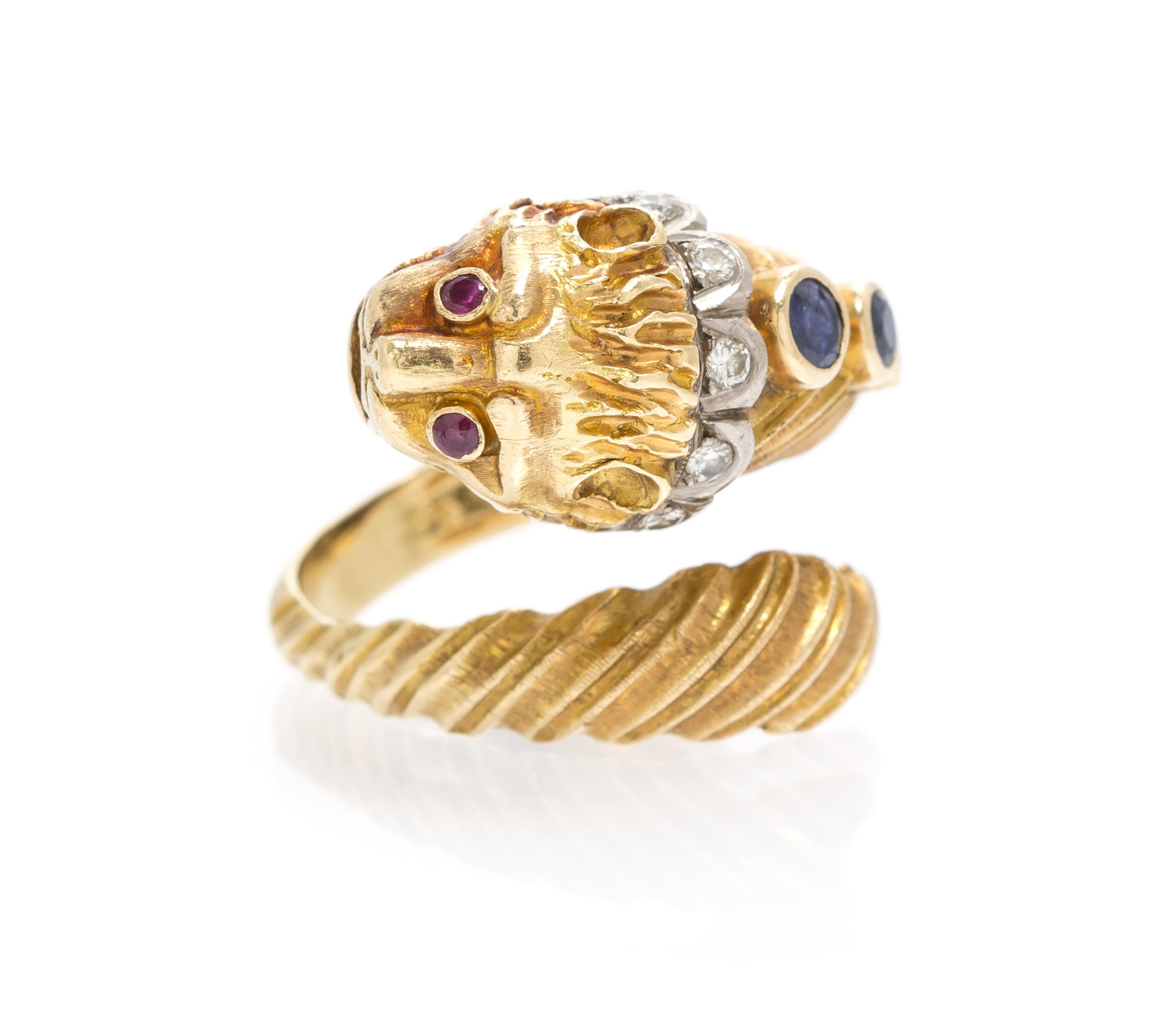 A Yellow Gold, Sapphire, Diamond and Ruby Lion Ring, 7.20 dwts.