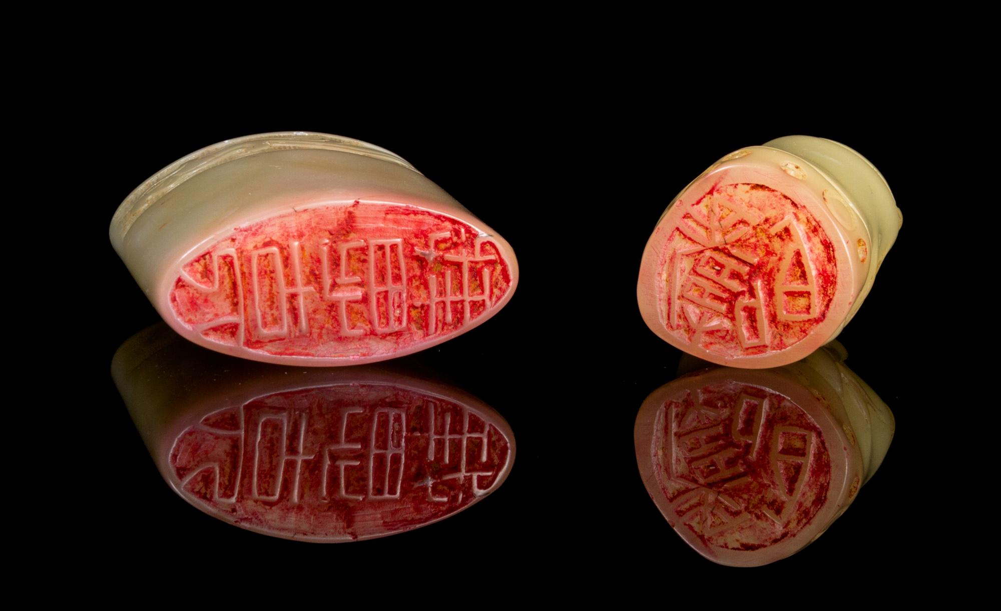 Two Carved Soapstone Seals Height of taller 1 7/8 inches.