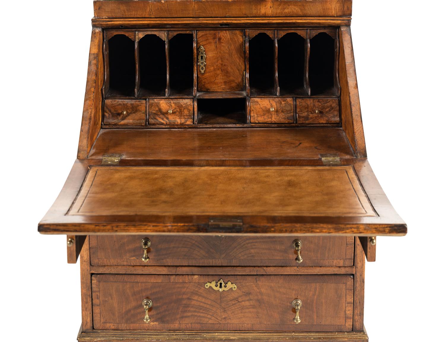 A George II Style Parcel Gilt Walnut Bureau Bookcase