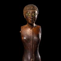 An Egyptian Wood Female Figure