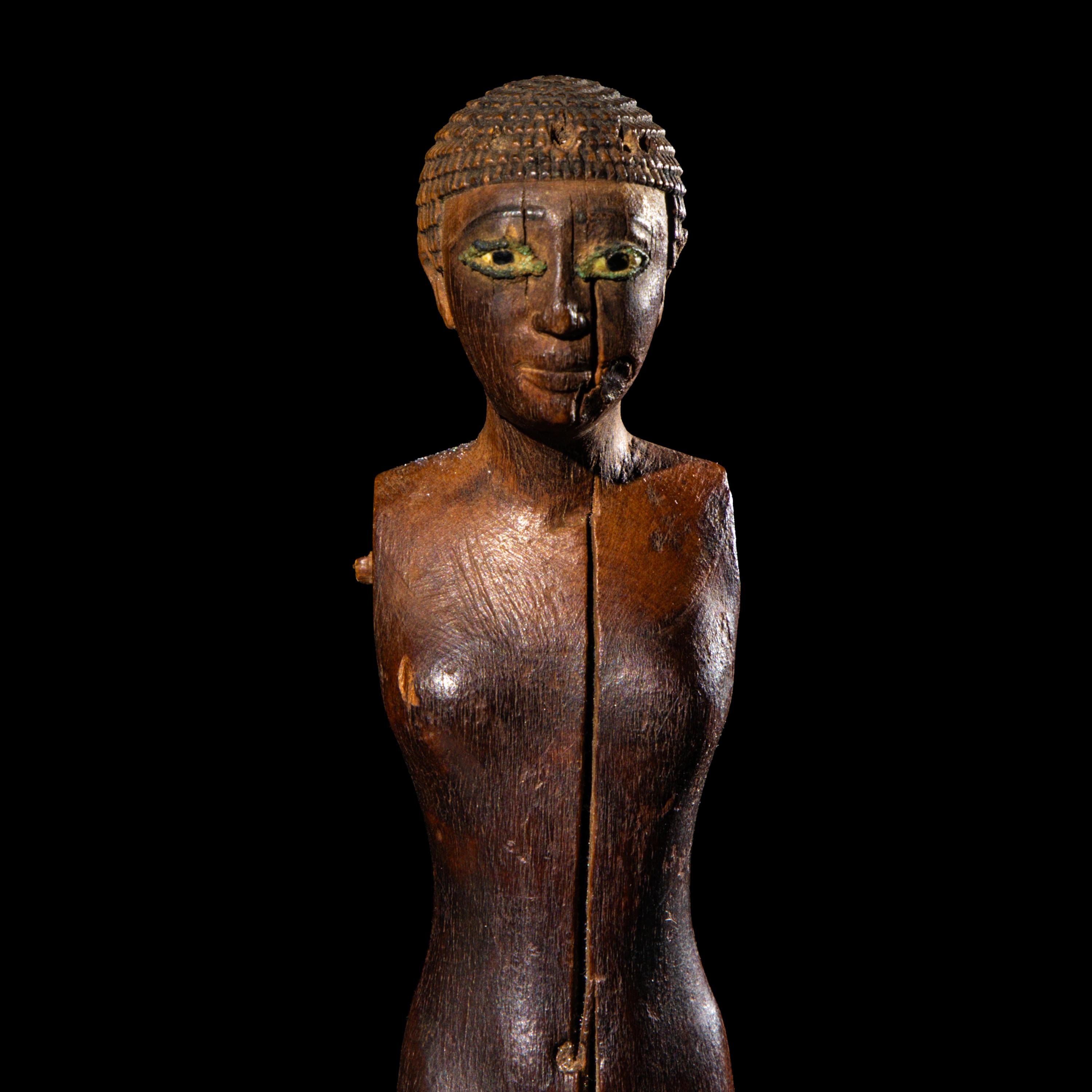 An Egyptian Wood Female Figure