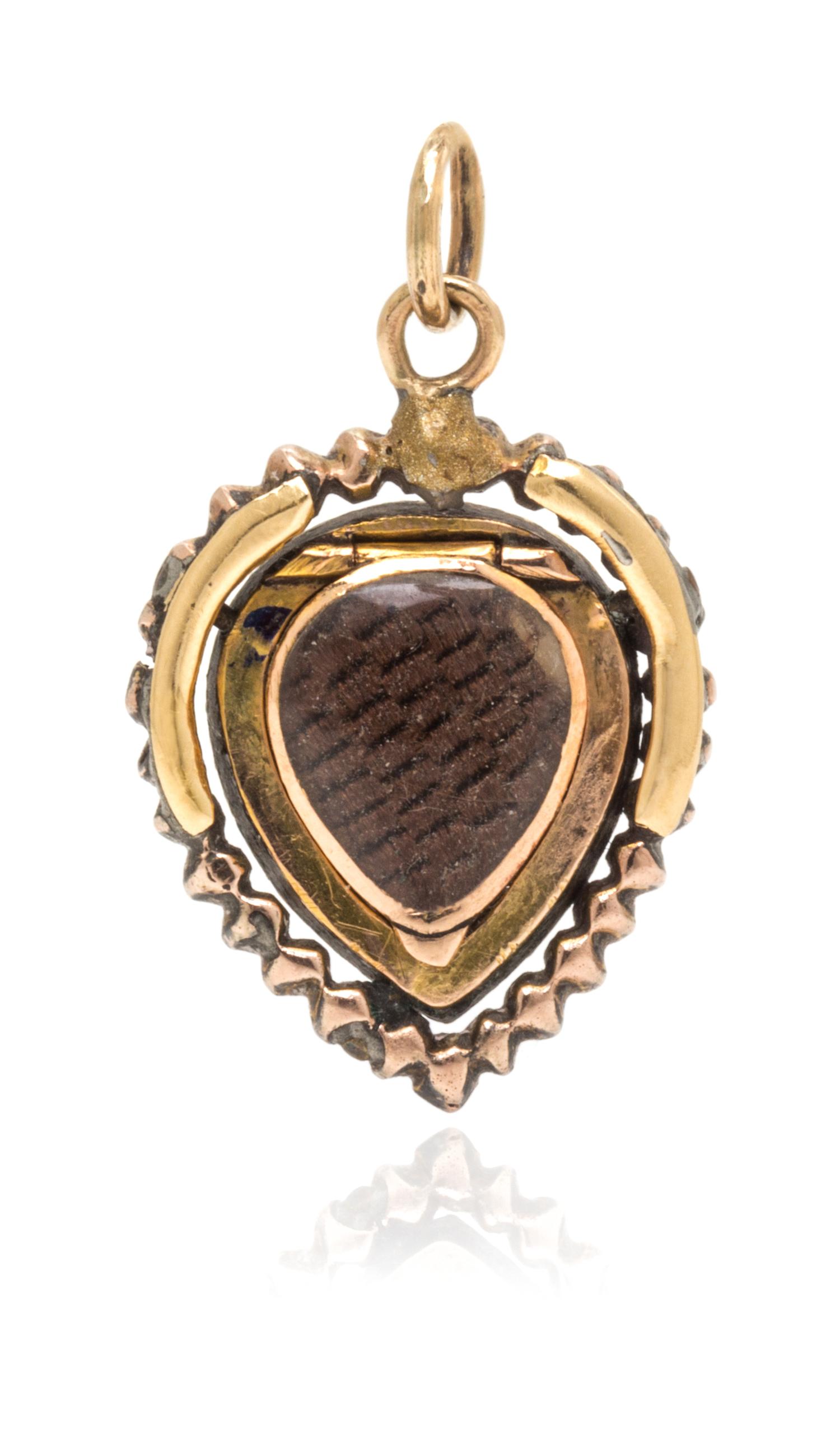 A Georgian Glass and Seed Pearl Lover's Eye Pendant, 1.70 dwts.