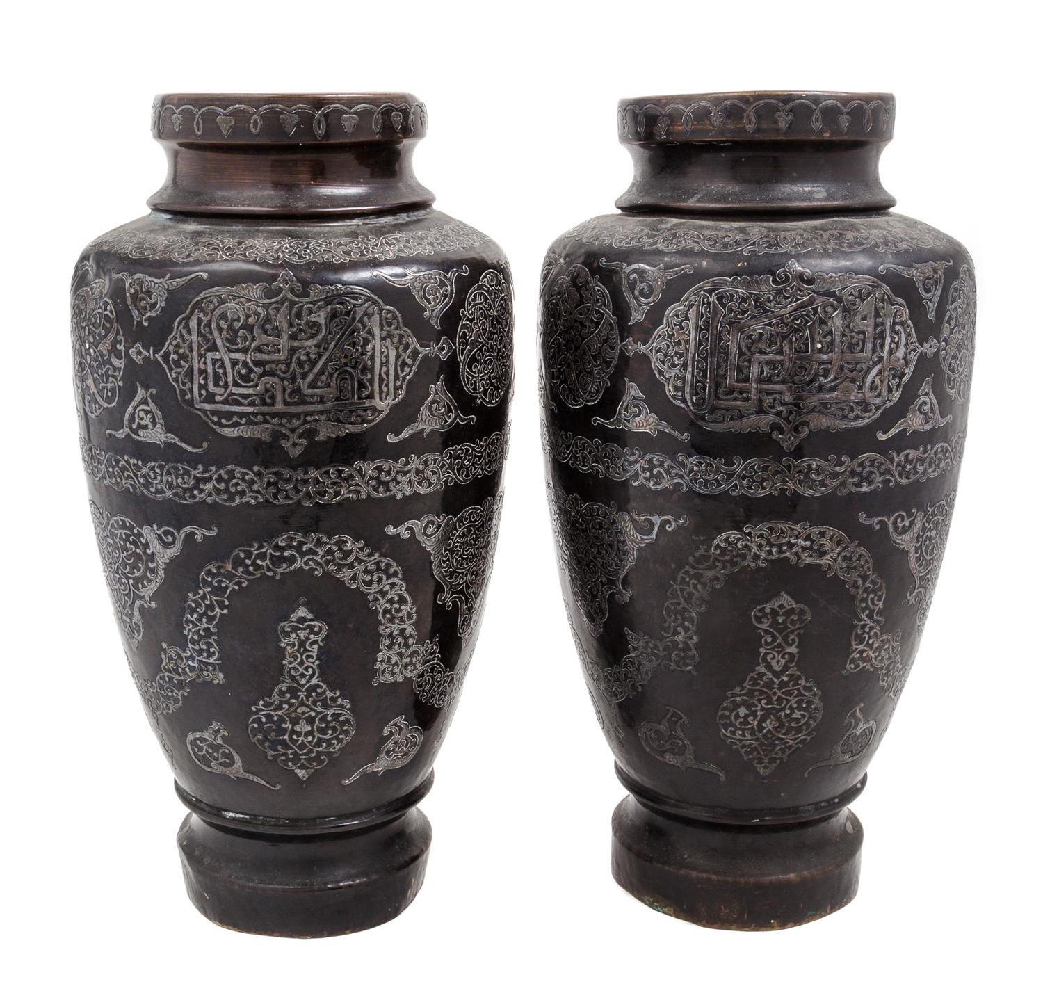 A Pair of Syrian Inlaid Metal Vases Height 14 1/2 inches.
