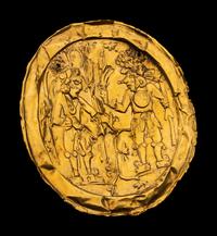 An Aztec or Toltec Gold Embossed Disc