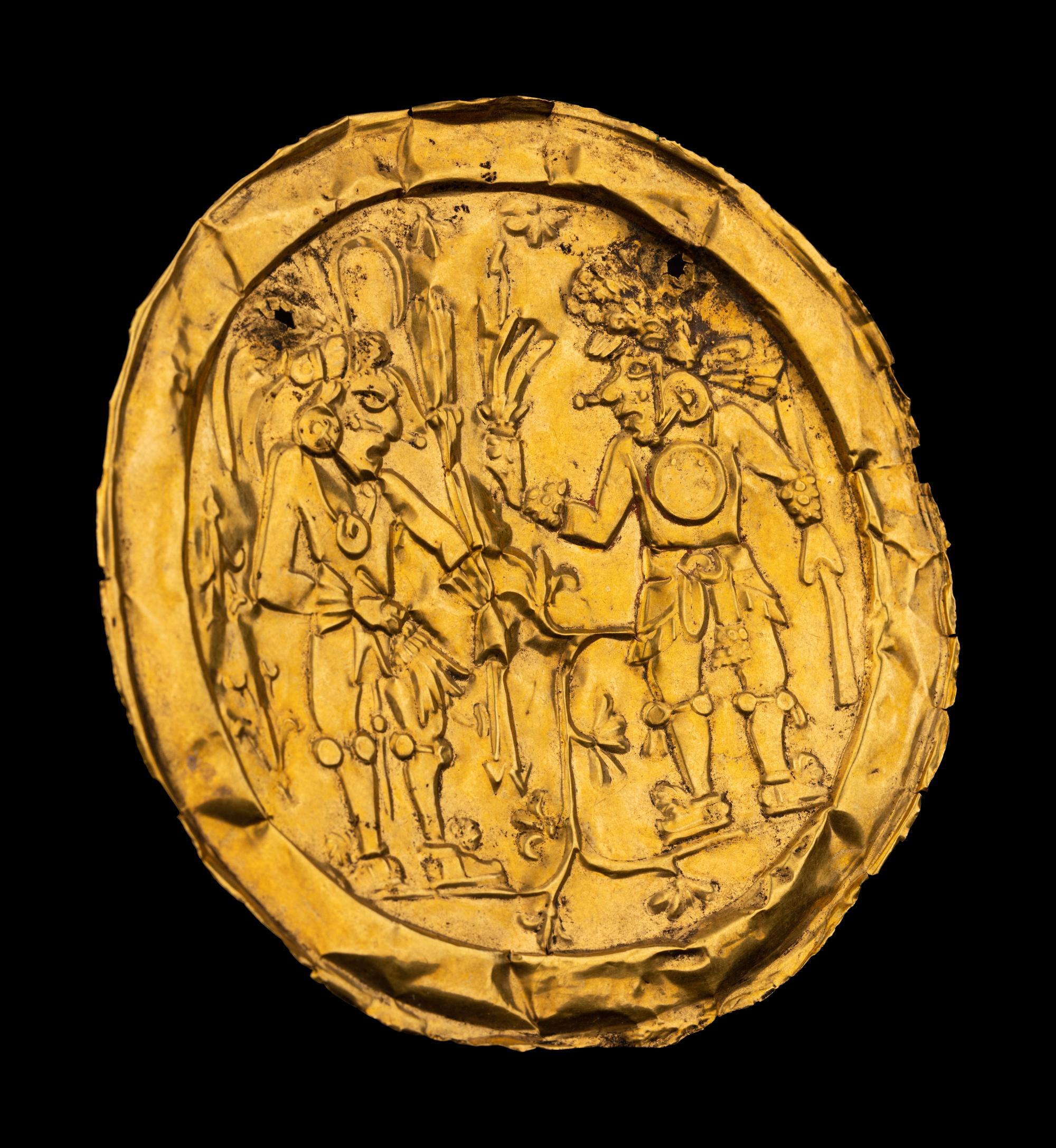 An Aztec or Toltec Gold Embossed Disc