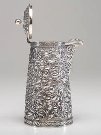 An American Silver Repoussé Chocolate Pot