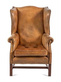 A George III Style Leather Upholstered Wingback Armchair