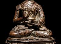 A Tibetan Bronze Figure of a Lama