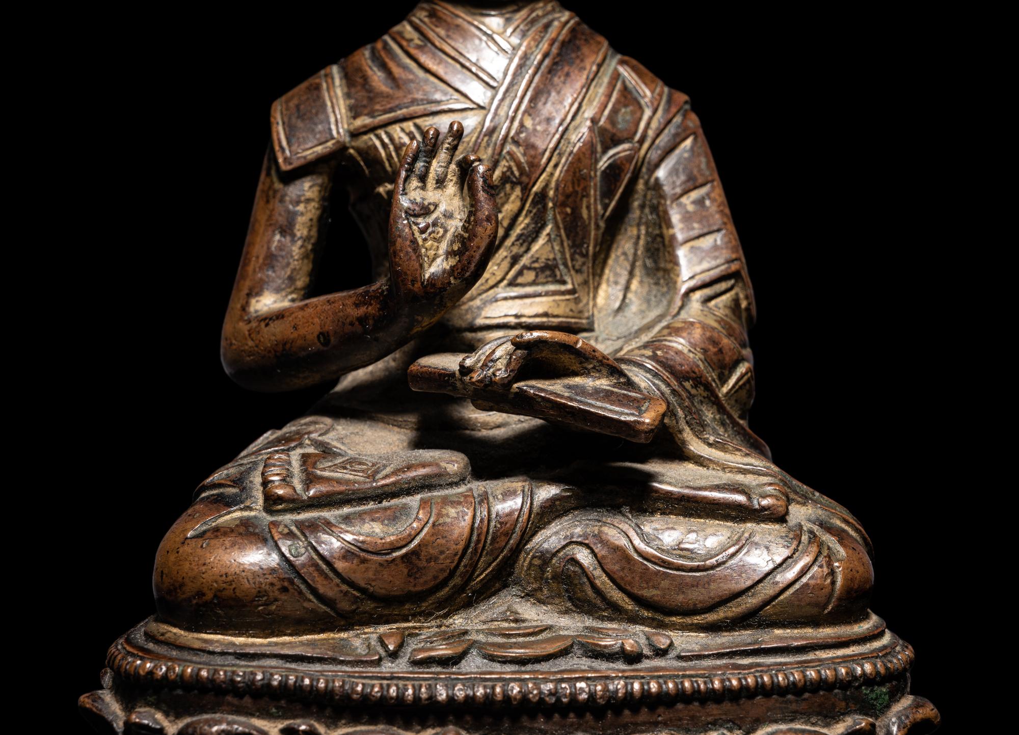 A Tibetan Bronze Figure of a Lama