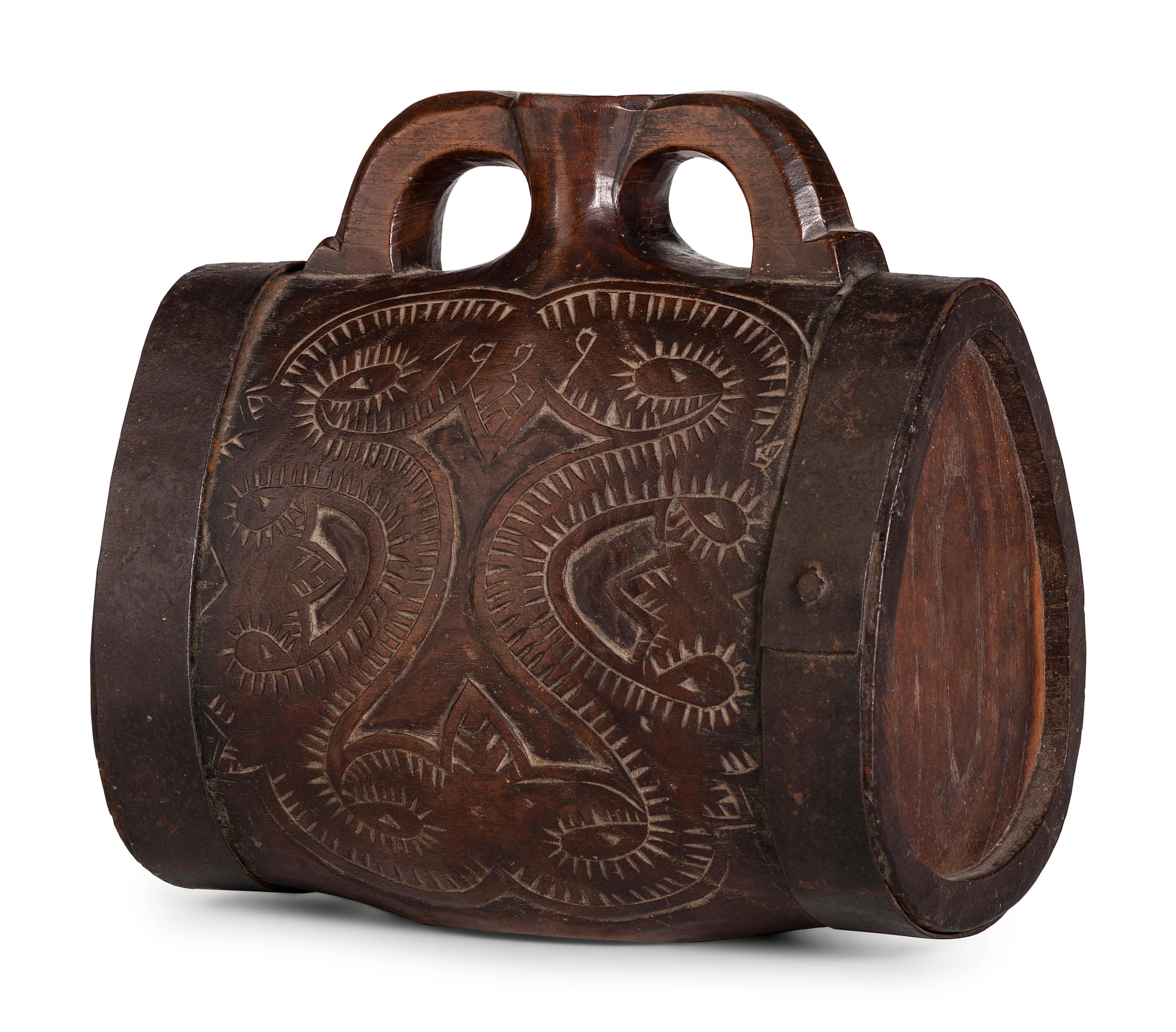 A Pennsylvania Dutch Carved Wood Canteen