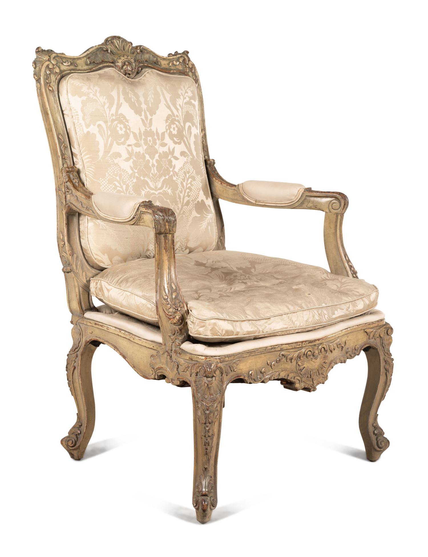 A Louis XV Style Carved and Gray-Painted Fauteuil