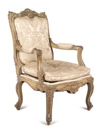 A Louis XV Style Carved and Gray-Painted Fauteuil