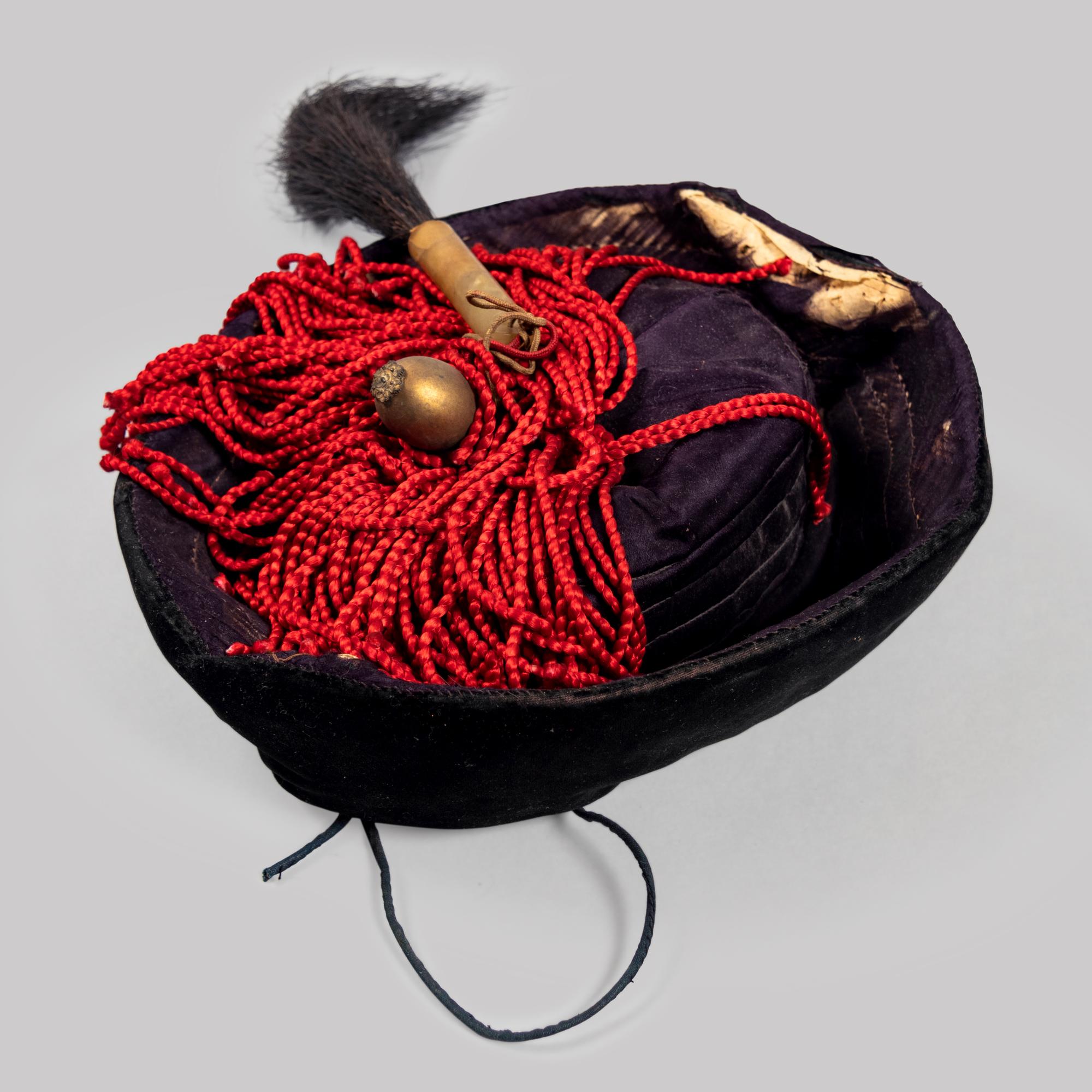 An Embroidered Silk Theatrical 'Dragon' Robe and an Official Hat