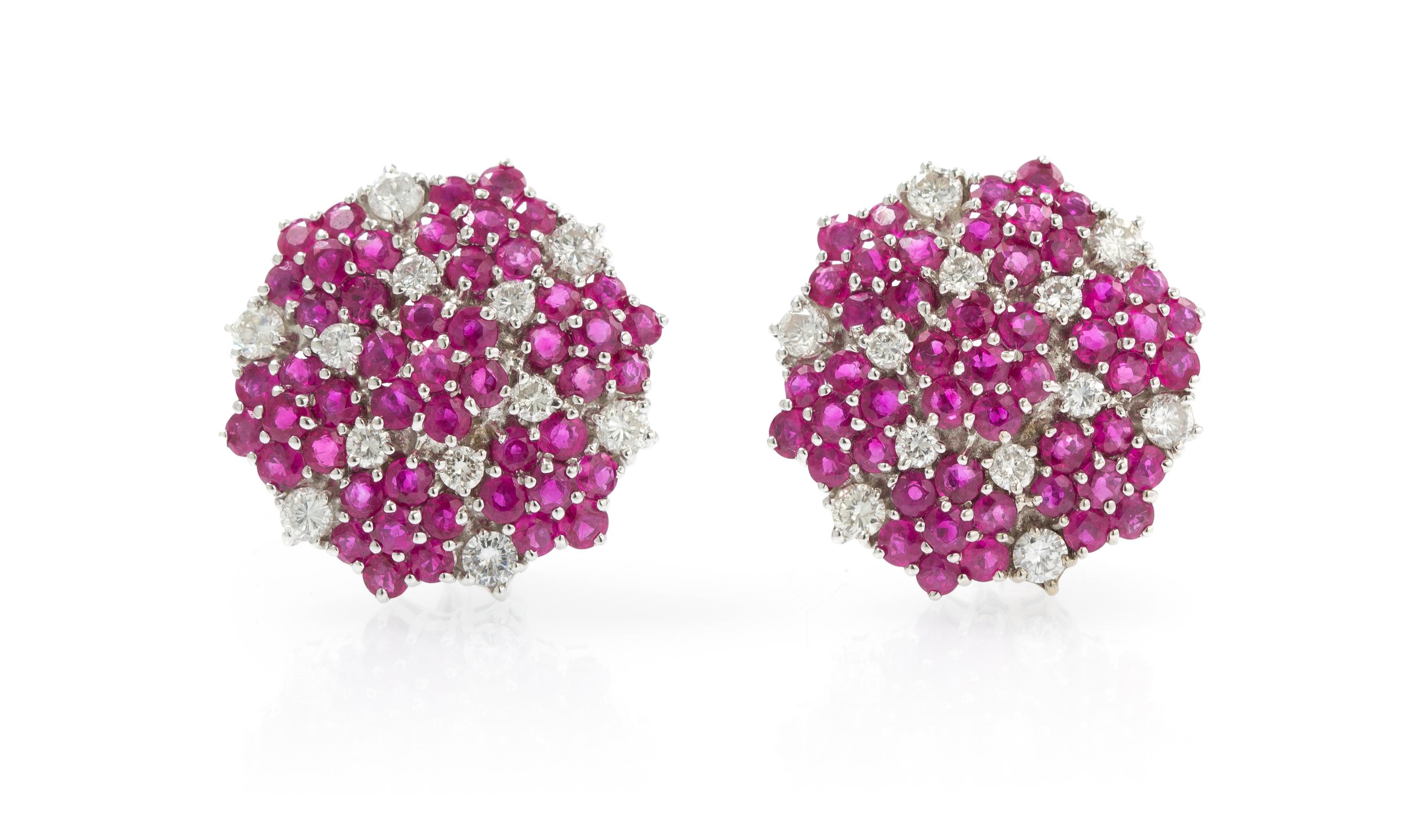 A Pair of 18 Karat White Gold, Ruby and Diamond Earclips, 13.00 dwts.