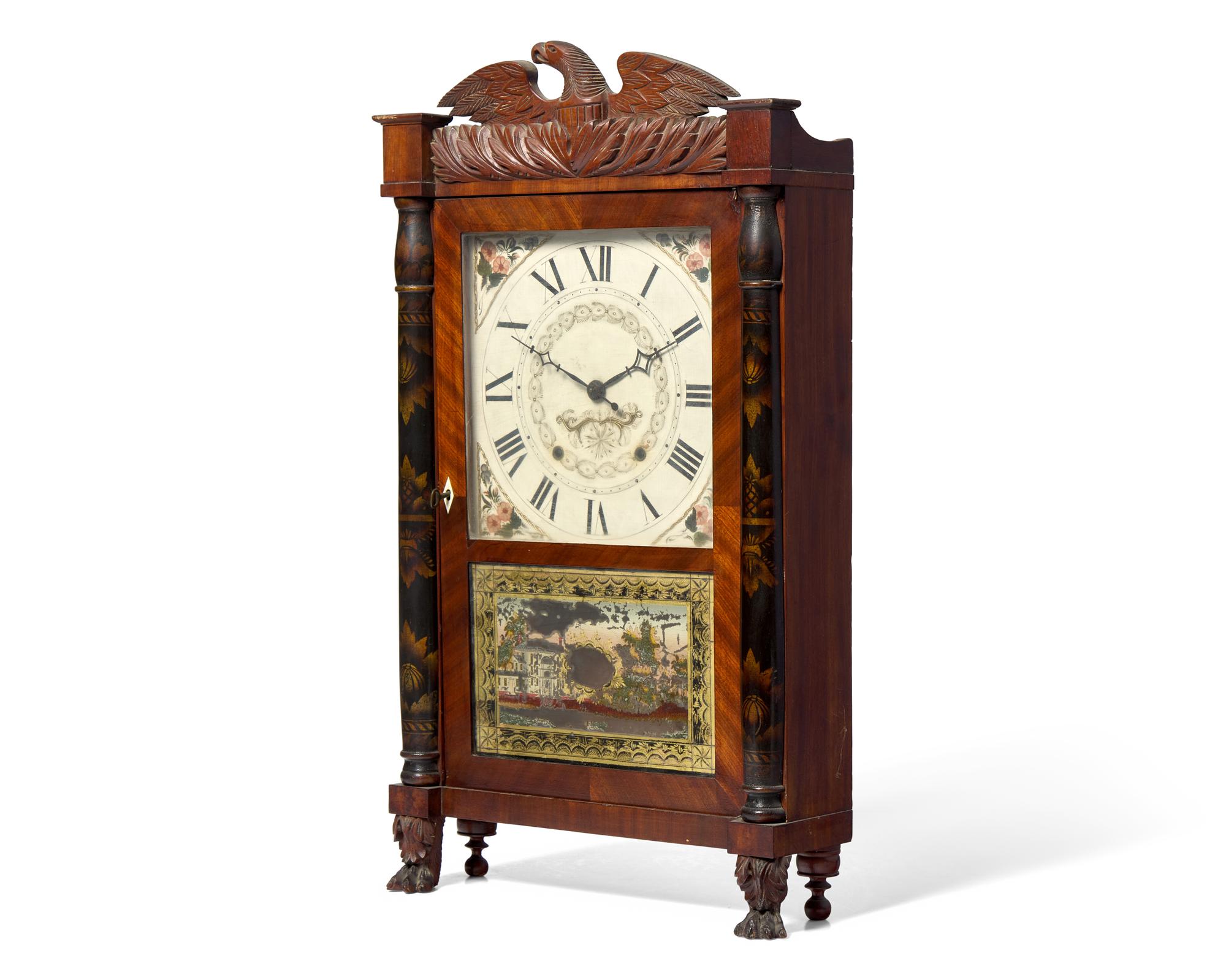 A Classical Carved Mahogany, Stencil-Decorated and Églomisé Shelf Clock