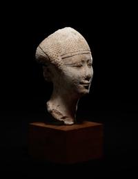 An Egyptian Limestone Head of a Noblewoman