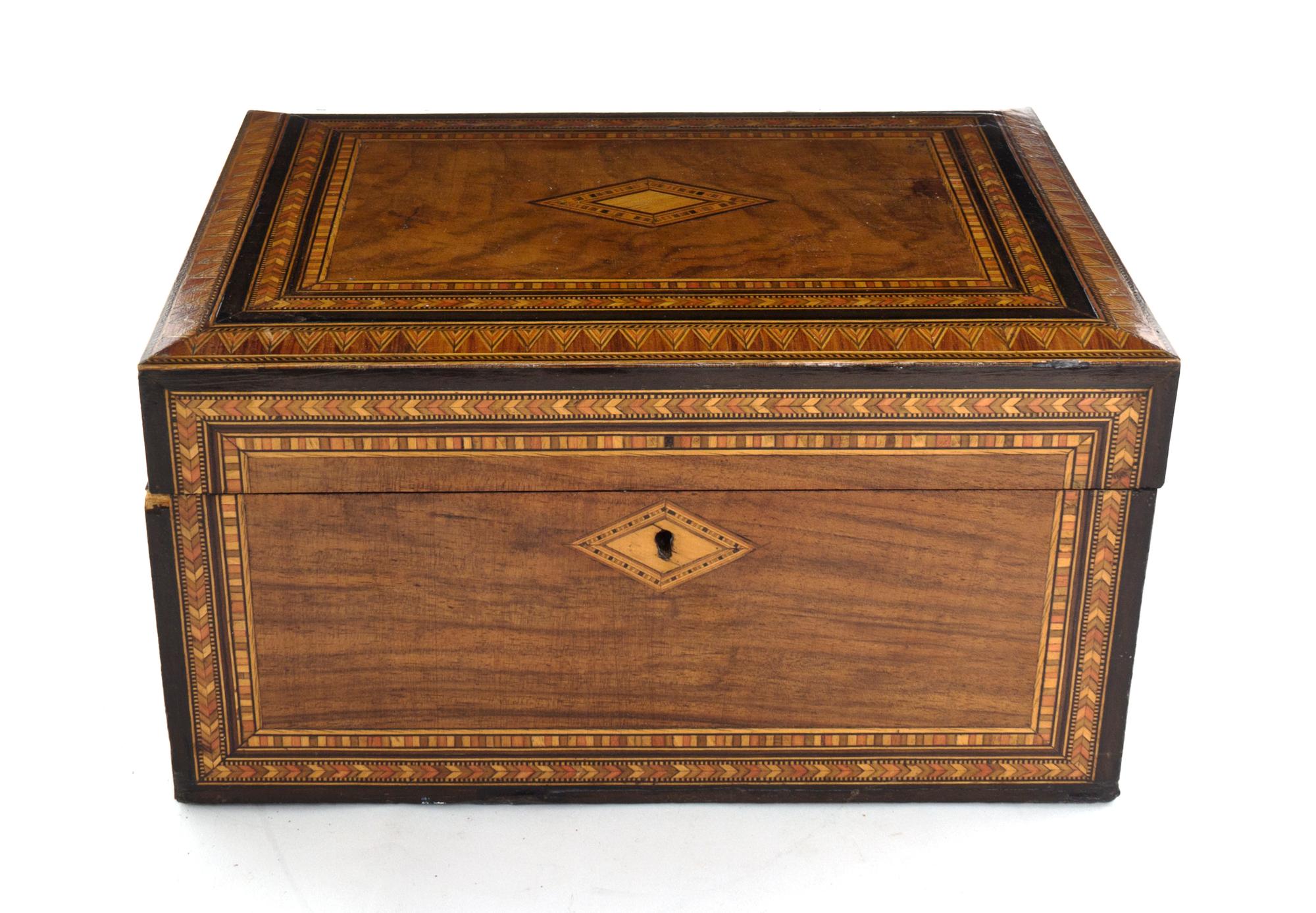 A Victorian Walnut and Parquetry Work Box, Width 11 inches.
