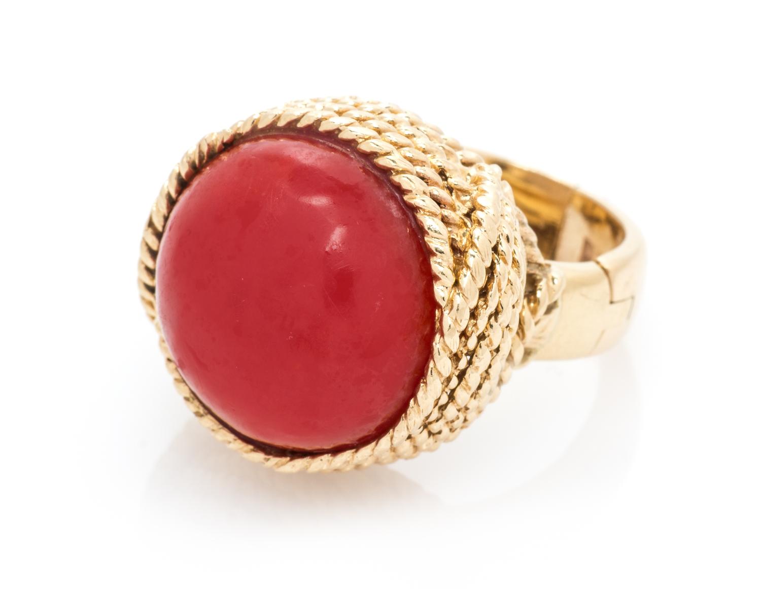 A 14 Karat Yellow Gold and Coral Ring, 11.90 dwts.