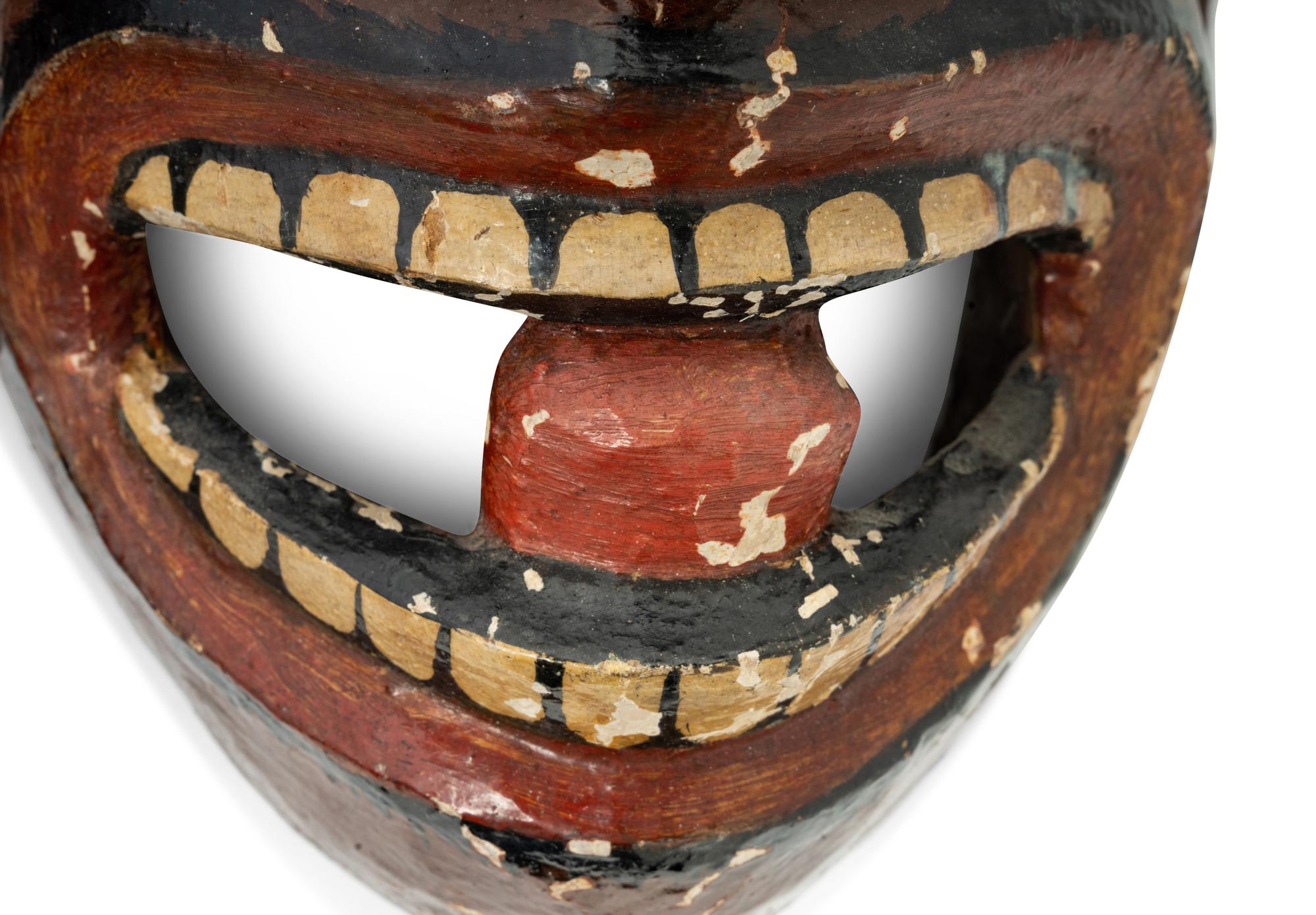 Three Mexican Carved and Polychromed Wood Masks