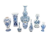 A Group of Eight Blue and White Earthenware Vases, Primarily Delft