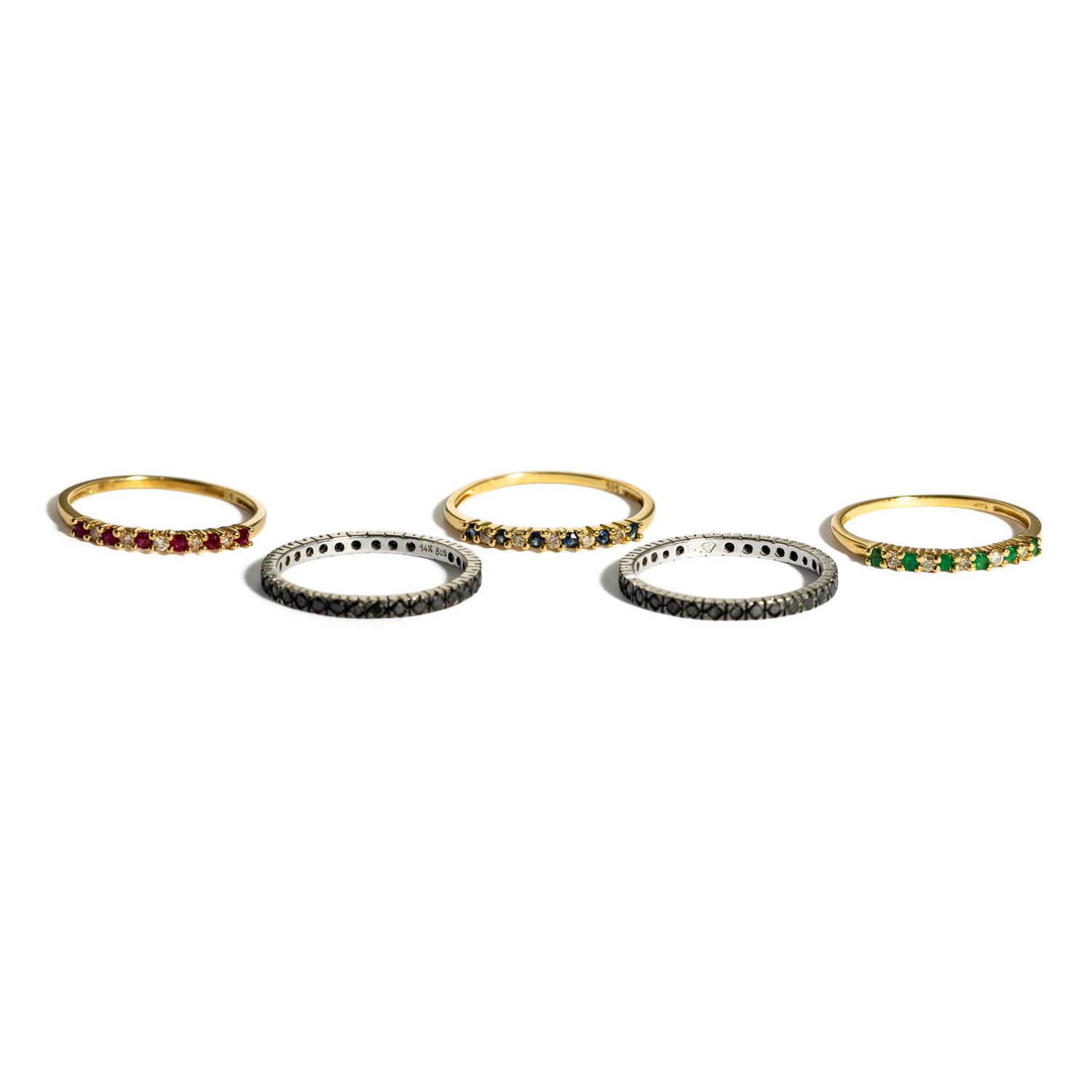 COLLECTION OF FIVE STACKING YELLOW GOLD AND MULITGEM BANDS