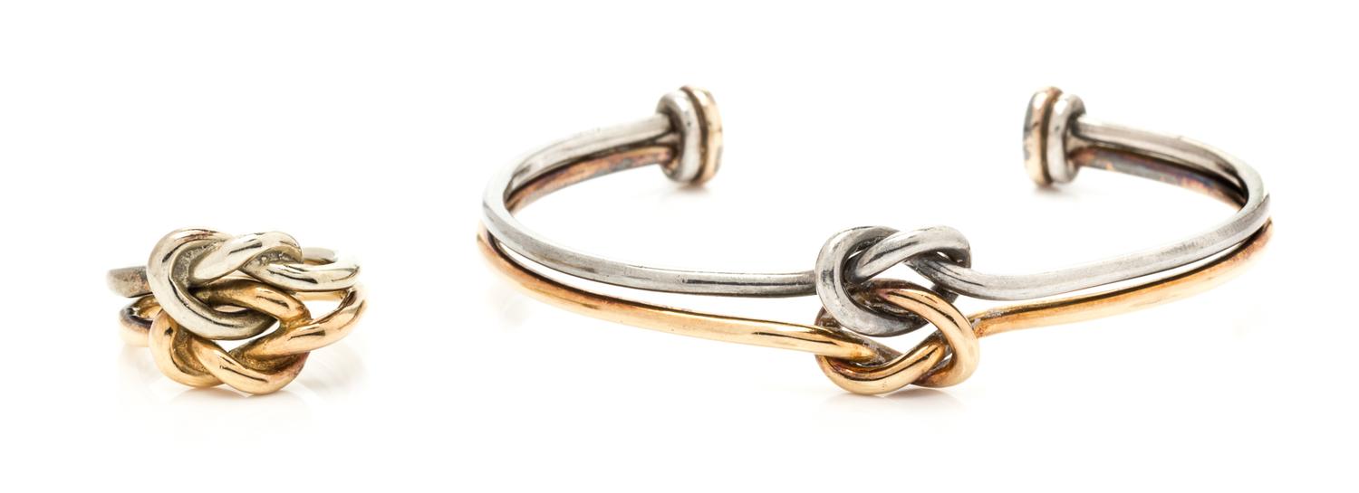 A Collection of 18 Karat Bicolor Gold and Sterling Silver Knot Motif Jewelry, Gucci, 17.7 dwts.
