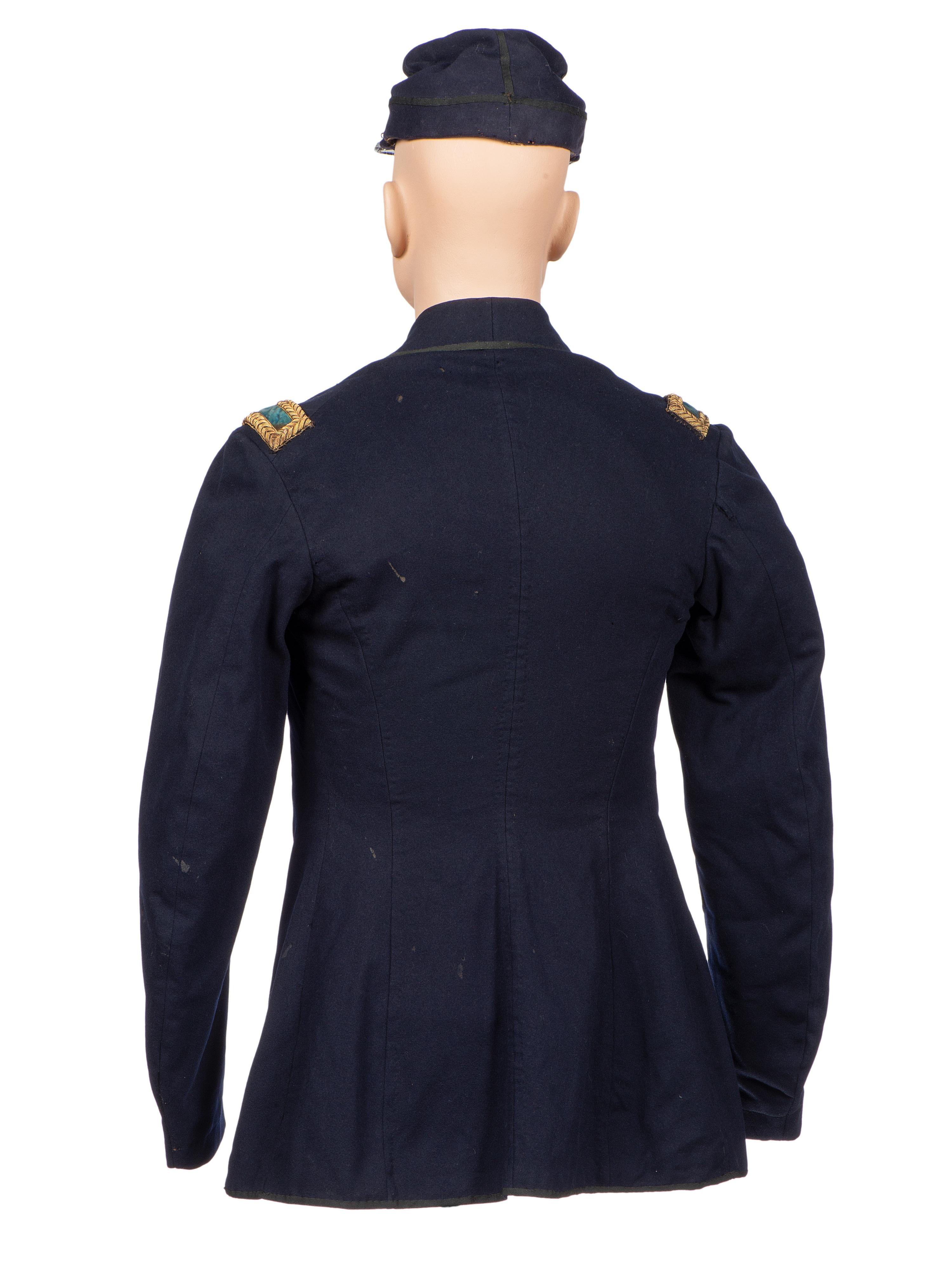 [CIVIL WAR]. Private purchase officer's sack coat, kepi, and carpet bag identified to Lieutenant Albert C. Sparks, Co. B, 37th Massachusetts Volunteers.