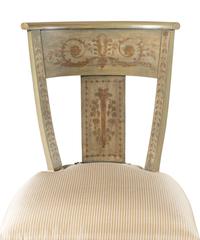 A Set of Four Painted Side Chairs