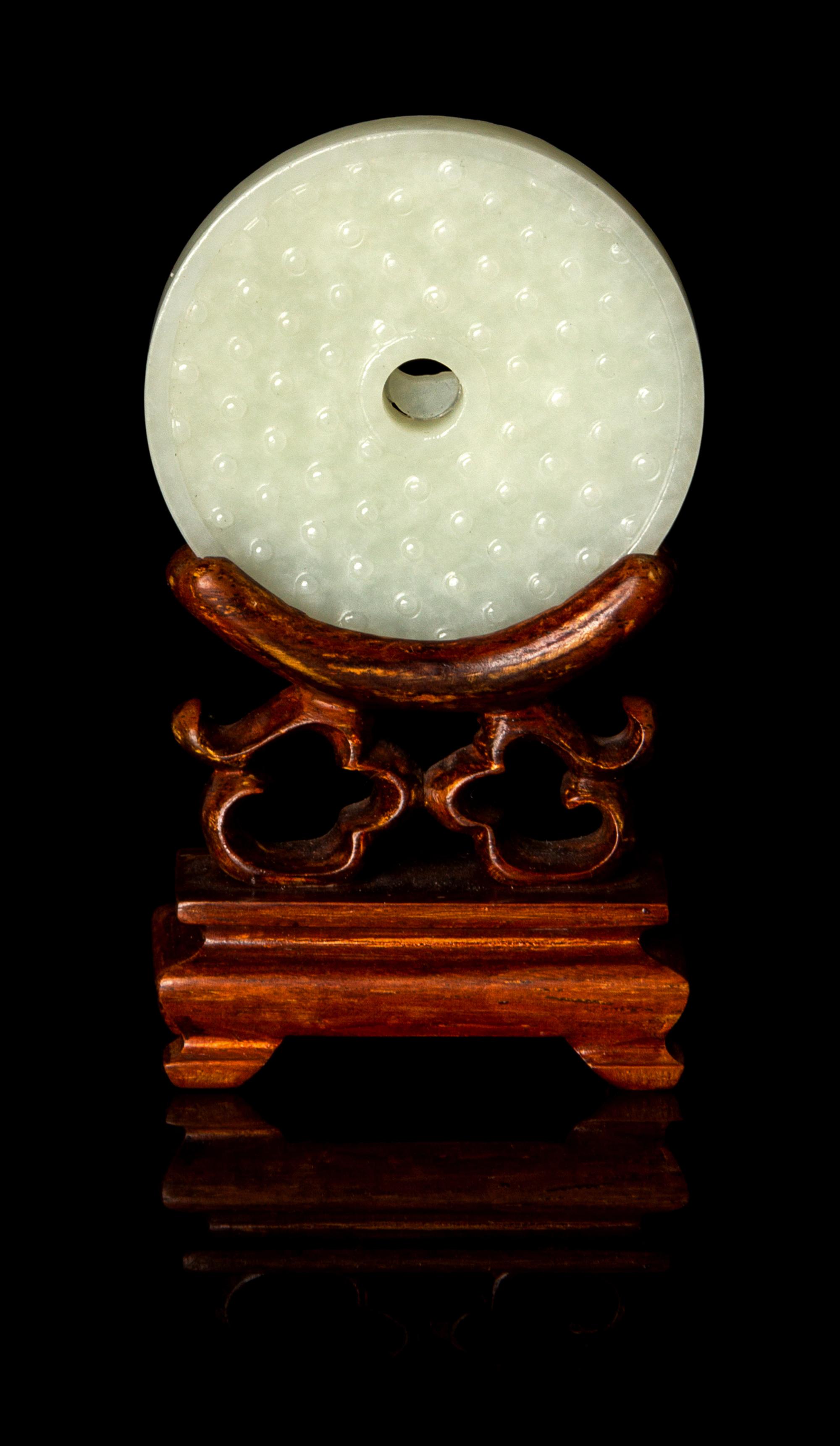 A Chinese White Jade Bi Disc