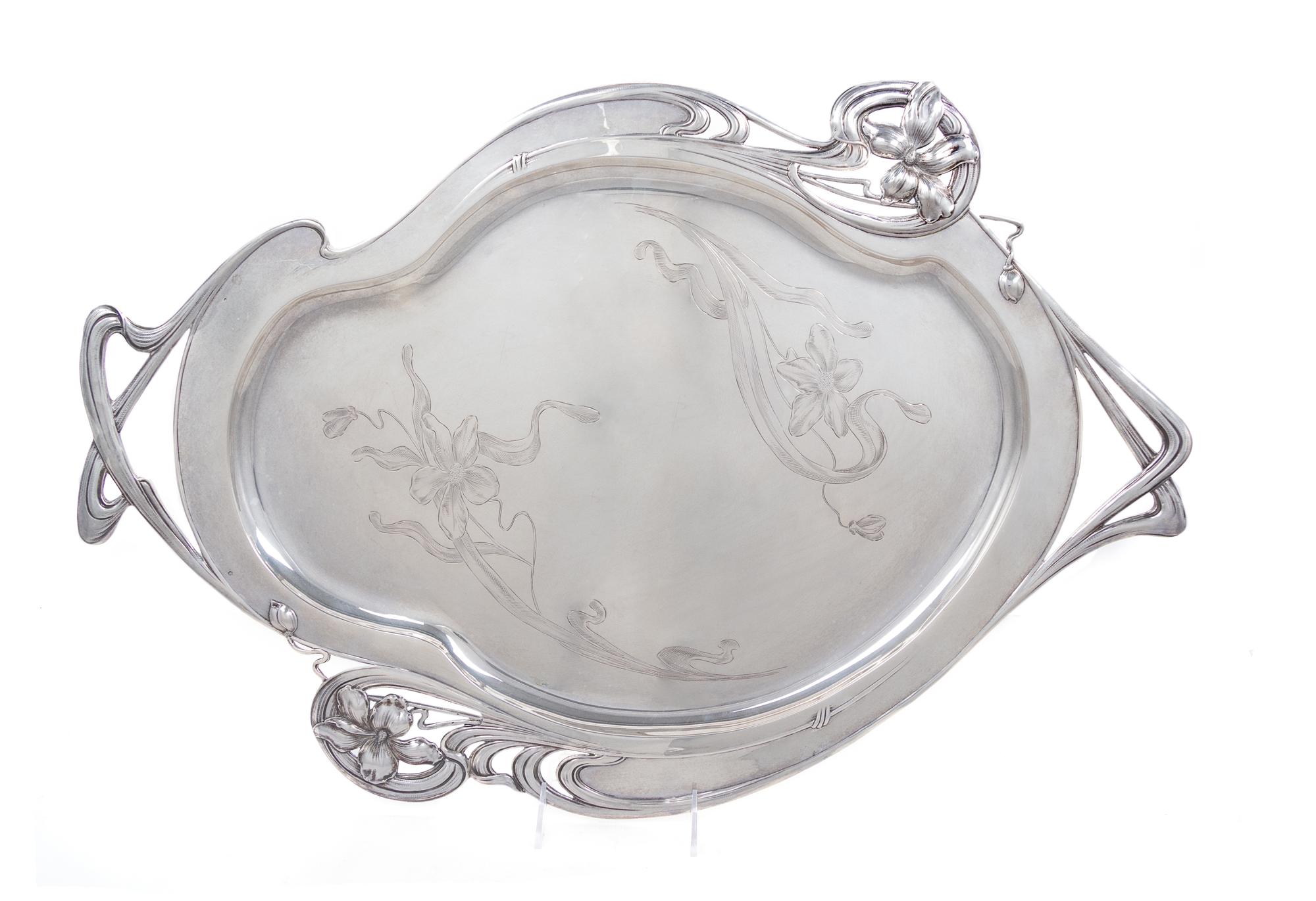 An Austro-Hungarian Art Nouveau Silver Tray, Maker's Mark MG, Vienna, Late 19th/Early 20th Century, the rim worked to show floral decor