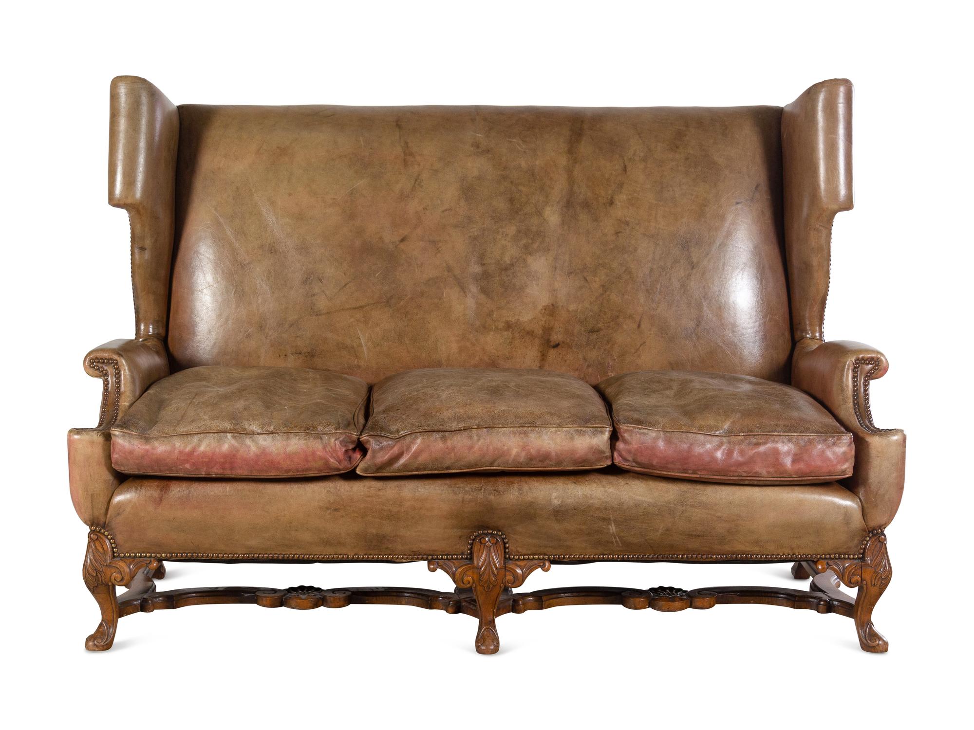 An English Leather-Upholstered Wingback Sofa