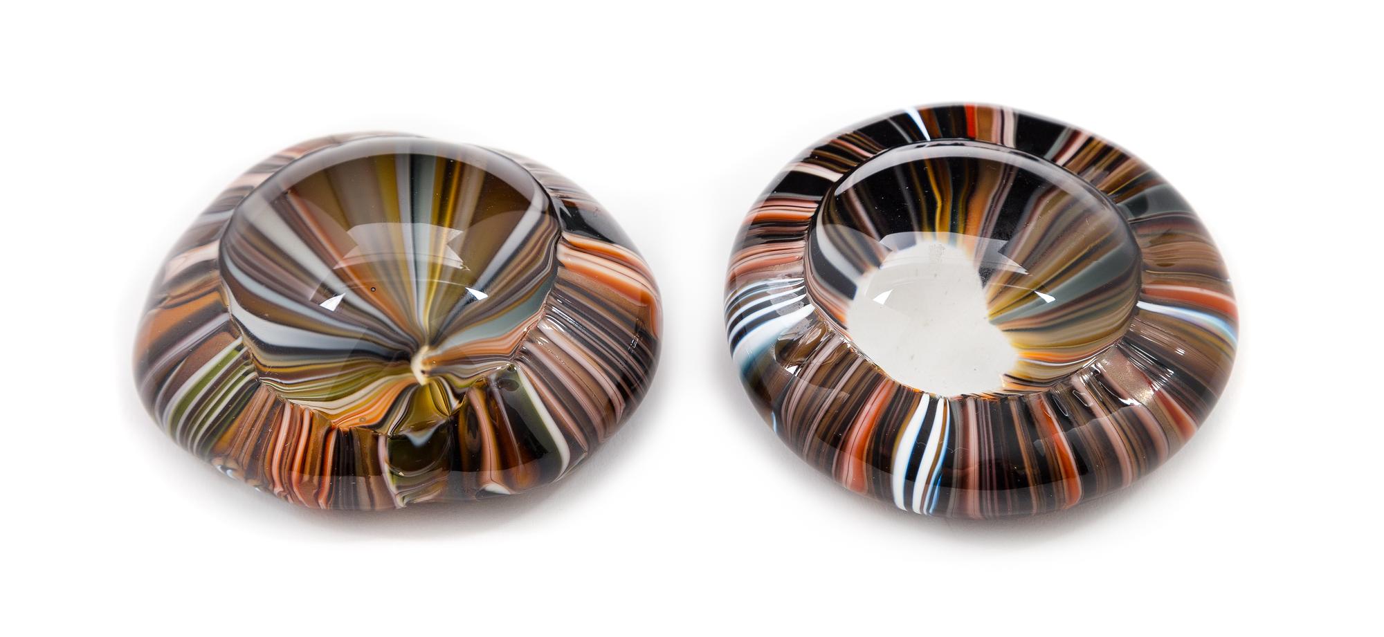 Caleb Siemon, (American), a group of sulfurated glass paperweights