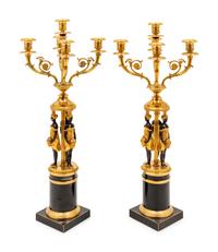 A Pair of Empire Style Gilt and Patinated Metal Figural Candelabra