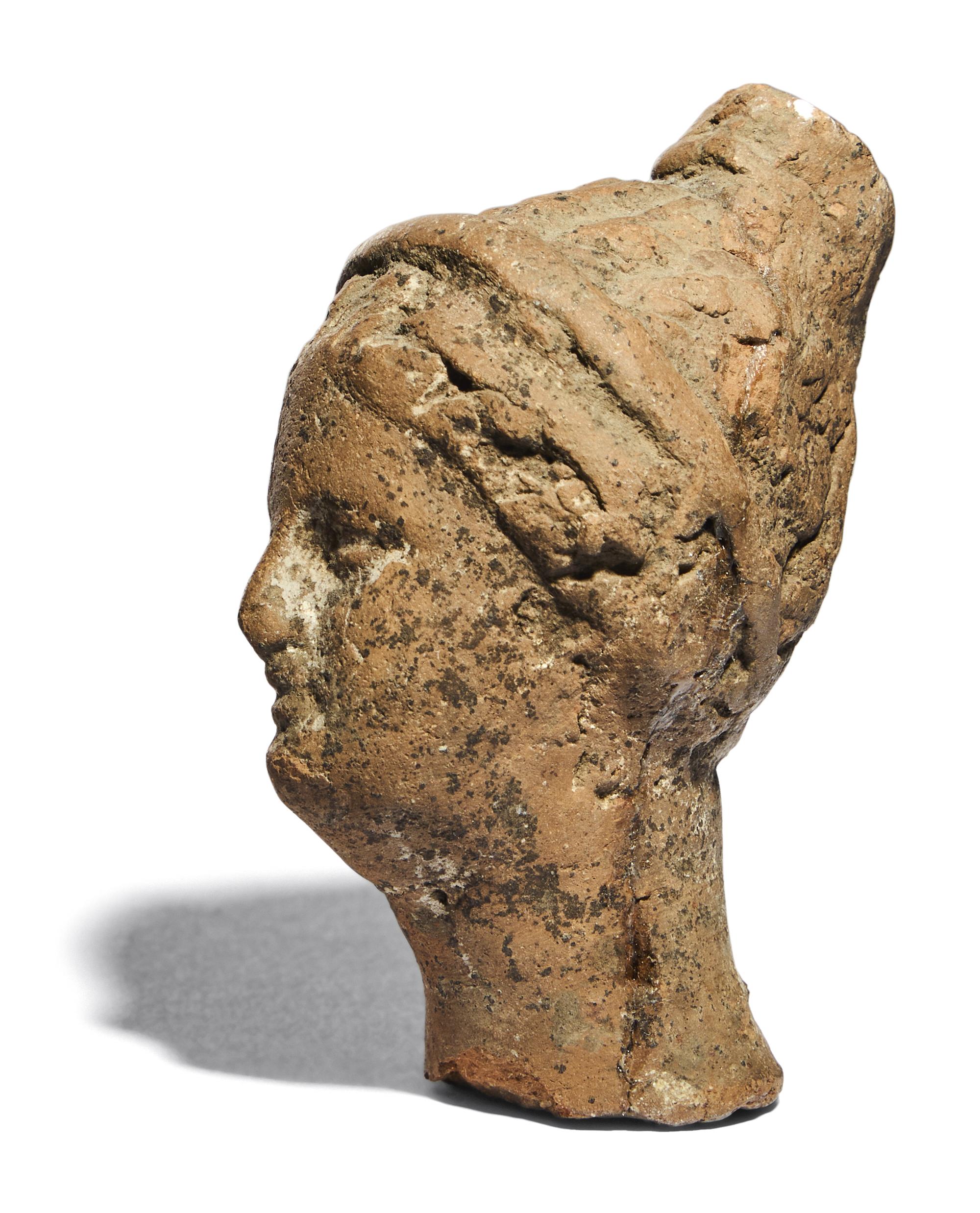 A Greek Terracotta Female Head