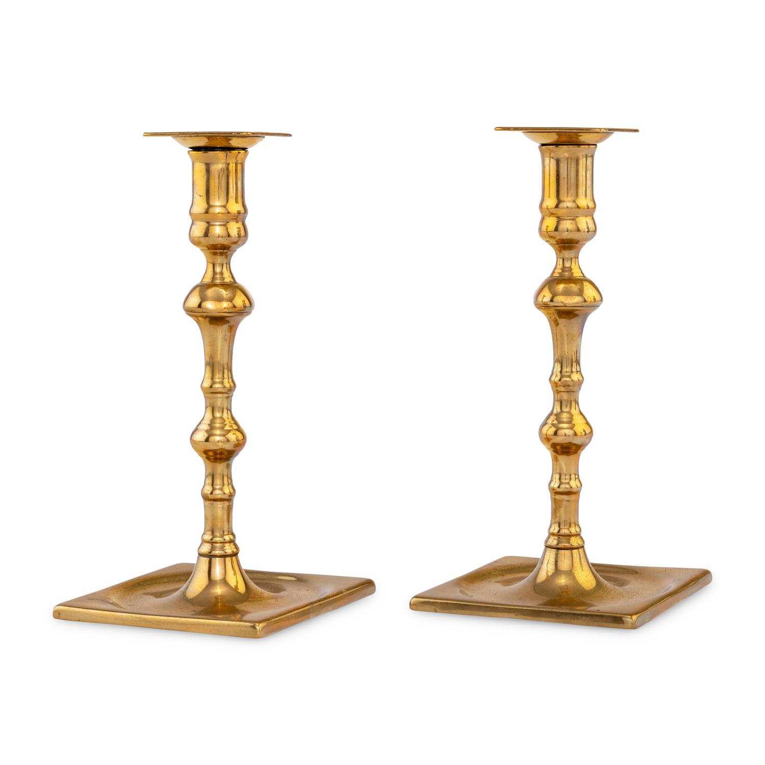 A Pair of George II Bell Metal Candlesticks