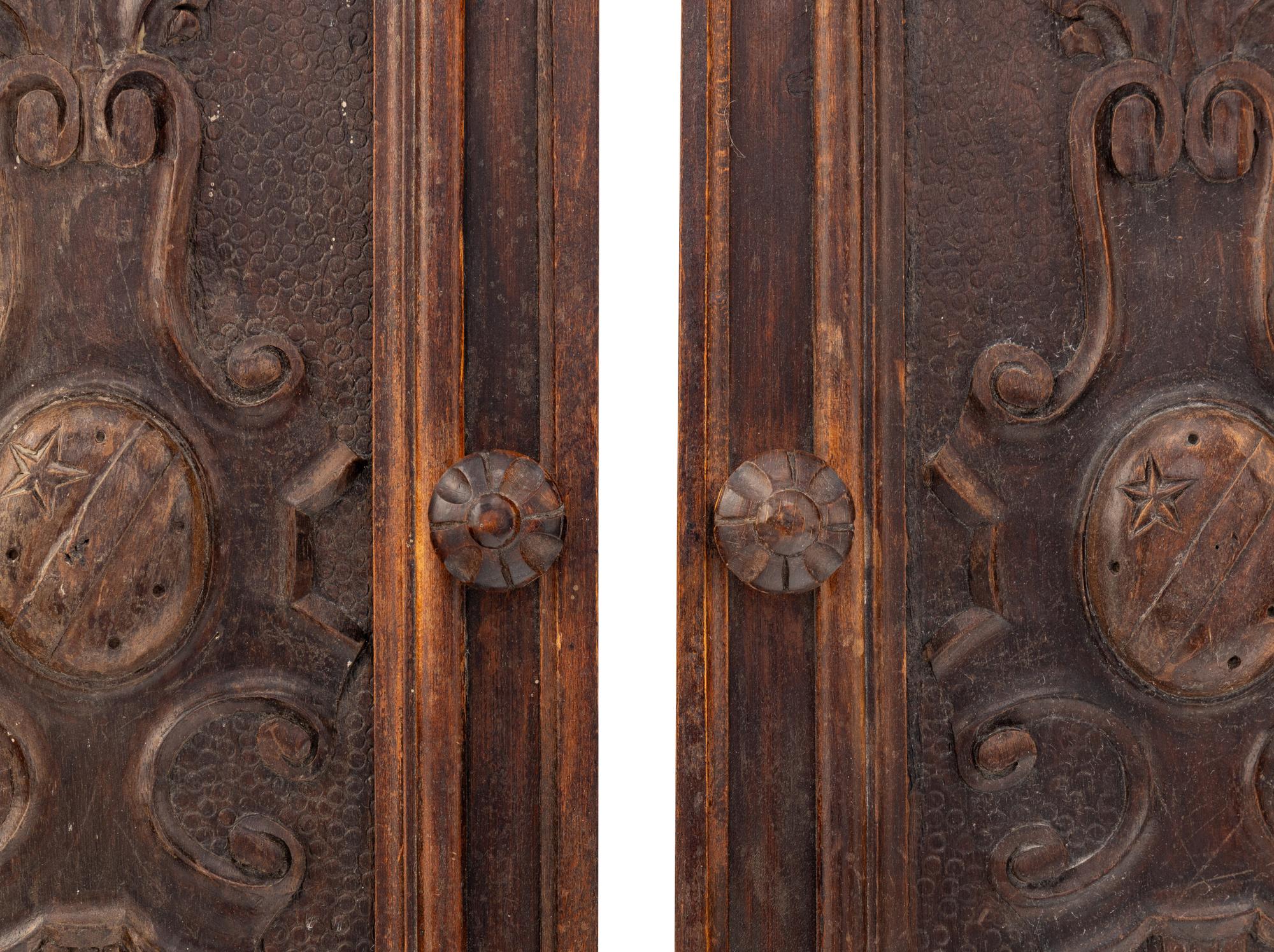 A Pair of Italian Walnut Cabinet Door Panels