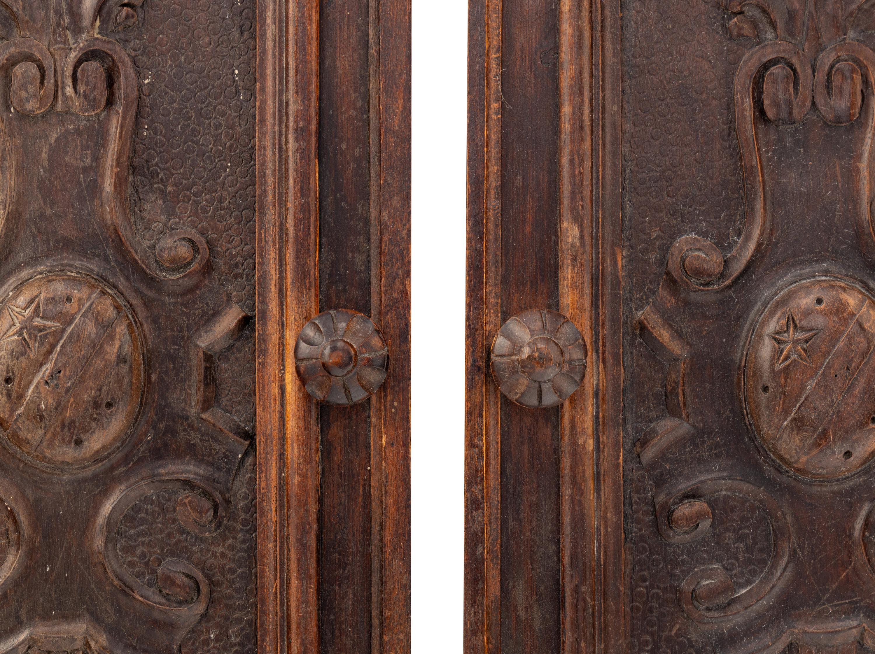 A Pair of Italian Walnut Cabinet Door Panels
